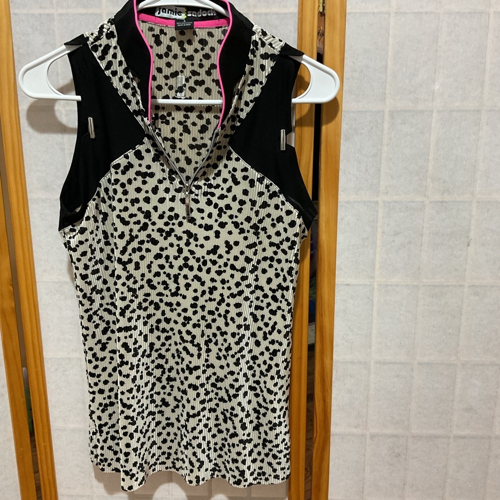 Jamie Sadock Black and tan spotted golf shirt.